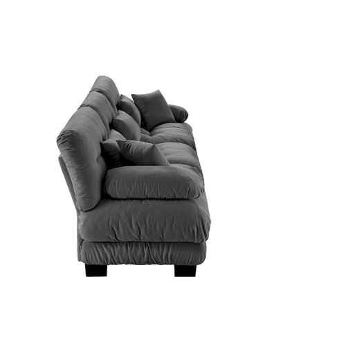 133.8 Canapé quatre places avec coussins ronds, accoudoirs et coussins d'assise profonds ; convient pour le salon.